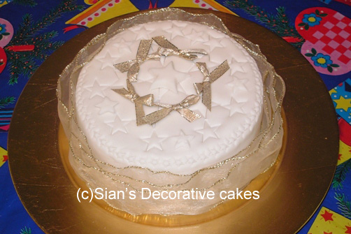 Christmas cake with bows and stars