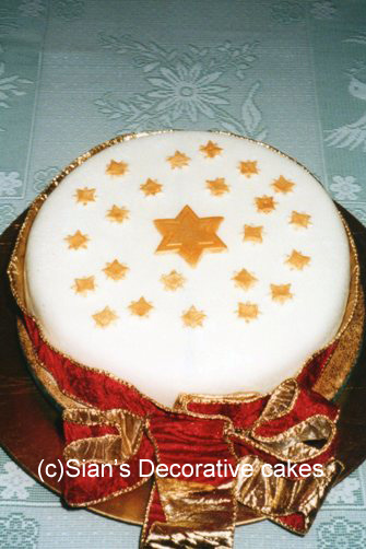 Christmas cake with gold stars